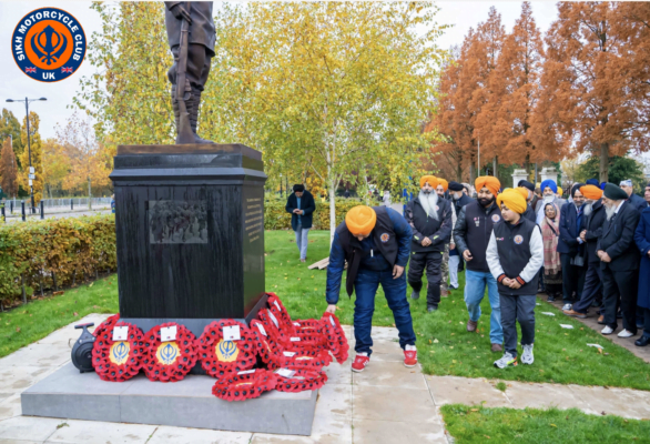 Sikh Motorcycle Club paying respects at the war memorial statue